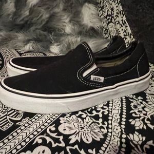Black canvas slip on vans